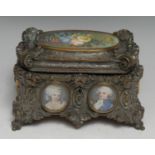A 19th century French Rococo Revival silvered table casket, cast throughout with scrolls, flowers,