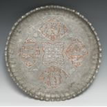 A Middle-Eastern tinned copper shaped circular tray, the field profusely chased in the Assyrian