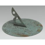 A verdigris patinated bronze sun dial, engraved personified sun, Arabic numerals, points of the