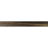 A Maasai lion spear, 88cm fullered blade, hardwood grip, spike pommel, 166cm long overall, c.1900