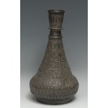 A Middle Eastern copper hookah base, chased in the Islamic taste with stylised lotus, 30cm high,