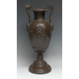 A 19th century Grecian Revival bronze and composition volute krater table urn, in the Grand Tour