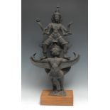 Indian School, a dark patinated bronze, Vishnu riding on Garuda, 58cm high, hardwood museum type