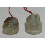 A Chinese jade tablet pendant, carved with an elder, 5.5cm long; another (2)