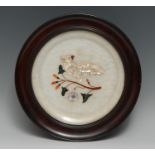 An Indian alabaster and pietra dura circular wall plaque, inlaid in specimen stones and 'Gujarat'