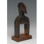 Tribal Art - a Senufo heddle pully figure, carved as a stylized bird, 21cm high, Ivory Coast, West