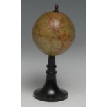 An early 20th century French miniature desk globe, Globe Terrestre, by Maison Forest, turned
