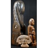 Tribal Art - a hardwood figural carving, probably Indonesian, 22cm high; a totem, 38cm high;