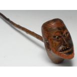 Folk Art - a late 19th century pipe, the bowl carved as the head of a bearded gentleman, grimacing
