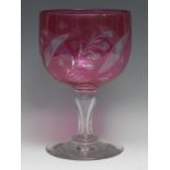 A large Victorian over-sized novelty cranberry glass goblet, circular bowl, inverted baluster