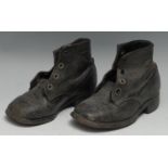 Costume - a pair of early 20th century child's black leather boots, hobnailed soles, 17.5cm long