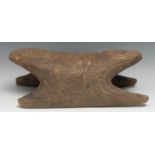 Tribal Art - a Papua New Guinea stool, possibly from a canoe, incise-carved with geometric motifs,