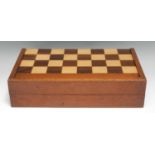 A 19th century mahogany and parquetry rectangular games box, inlaid for chess, the interior with