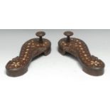 A pair of Ottoman bath shoes, each carved with scrolling leaves and inlaid with bone, 25.5cm long