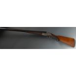 12 Bore Side by Side side lock ejector shotgun serial number 33150. Barrel length 28 inches.