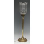 A brass desk or table lamp, Edwardian etched glass shade, dished circular base, 49cm high overall