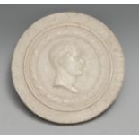 A 19th century sulphur cameo portrait roundel, of Napoleon Bonaparte as a Roman emperor, bust-length