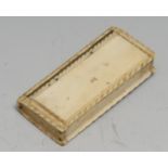 An early 19th century bone novelty snuff box, as a book, possibly Napoleonic prisoner of war, hinged
