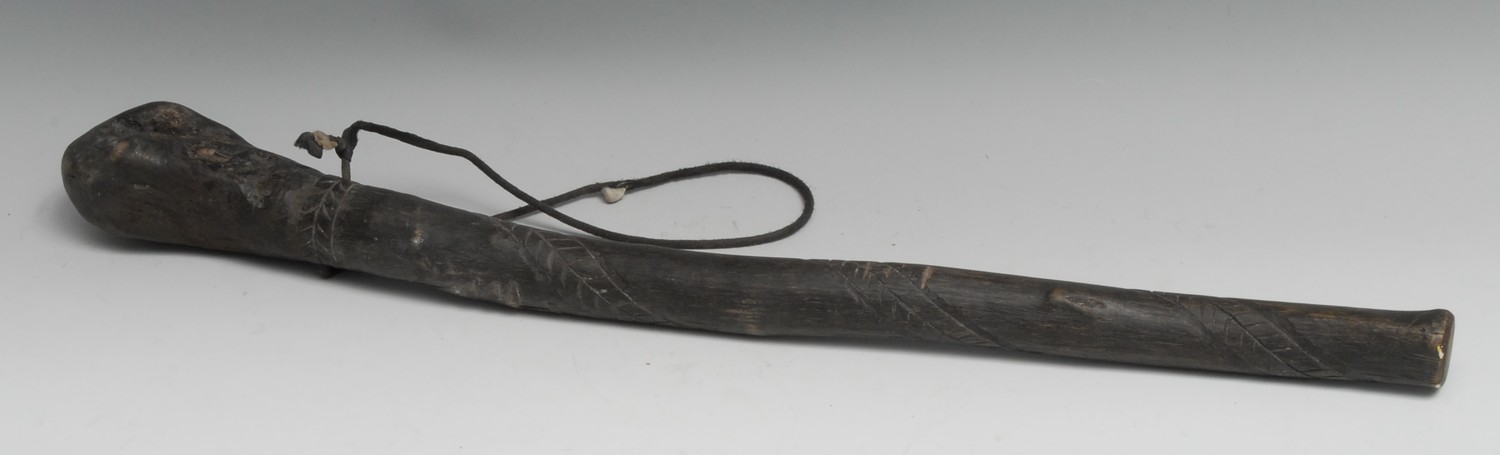 Tribal Art - an Inuit baculum oosik, as a club, carved in relief with a pine tree and geometric