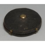An 18th century shagreen circular pocket case, hinged cover enclosing a magnifying lens, 7cm diam,