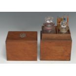 An early 20th century mahogany rectangular travelling decanter box, the push fitting cover enclosing