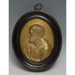 A 19th century gilt bronze oval portrait plaque, of Saint Paul, after the Renaissance, bust