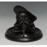 A late 19th century novelty inkwell, as the head of a musketeer, with broad hat, moustache and