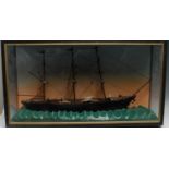 A maritime diorama, of a three-mast ship on a choppy sea, ebonised case, 45.5cm high, 84cm wide