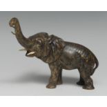 An early 20th century cold painted bronze, of an elephant, standing with trunk raised, as a pocket