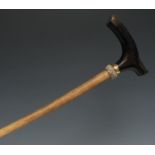 A 19th century marine bone walking stick, the shaft possibly a whale rib, serpentine L-shaped