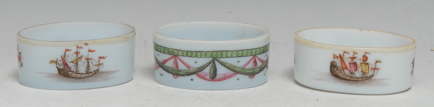 A 19th century opaline glass oval salt, the interior painted with a beetle, the side with drapery