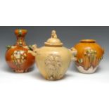 A Chinese garlic-head vase, in the Tang manner, glazed in mottled tones of green, yellow and