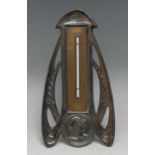 A French Art Nouveau easel desk thermometer, embossed with a portrait roundel and whiplash curves,