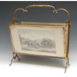 An unusual French polished brass articulated drawing room periodical rack, the folio stands