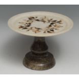 An alabaster, specimen marble and serpentine tazza, the dished top inlaid with a band of flowering
