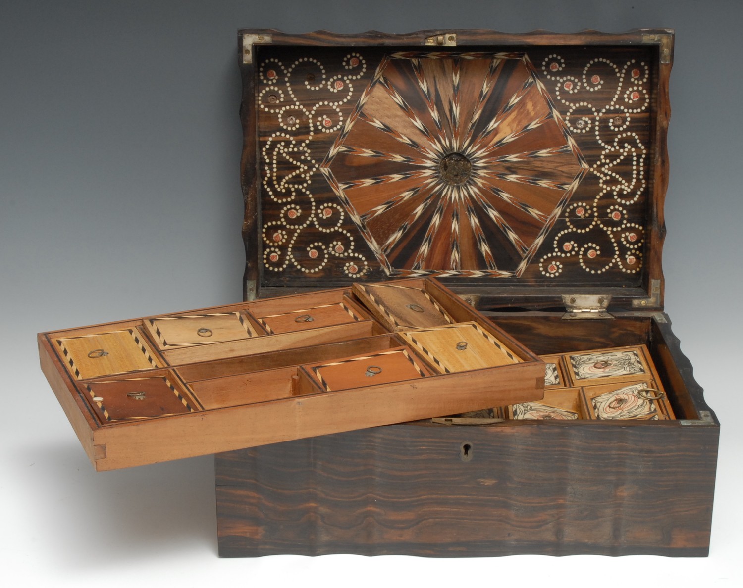 A 19th century Anglo-Indian/Ceylonese commode shaped work box, hinged cover enclosing a marquetry - Image 2 of 2