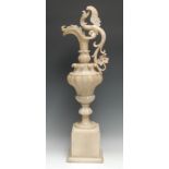 A large 19th century Derbyshire alabaster ewer, boldly carved with scrolling acanthus, square