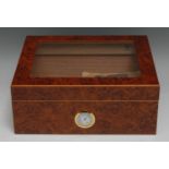 A Germanus amboyna cigar humidor, hinged glazed cover, hygrometer, 26cm wide