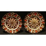 A pair of Royal Crown Derby 1128 pattern shaped circular plates, 22cm diameter, printed marks in