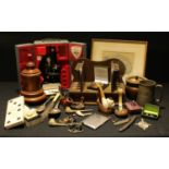 Boxes and Objects - a 19th century treen tobacco jar; a pipe rack and pipes; a students