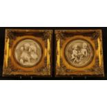 A pair of composite marble circular wall plaques moulded in relief with cherubs and children, one