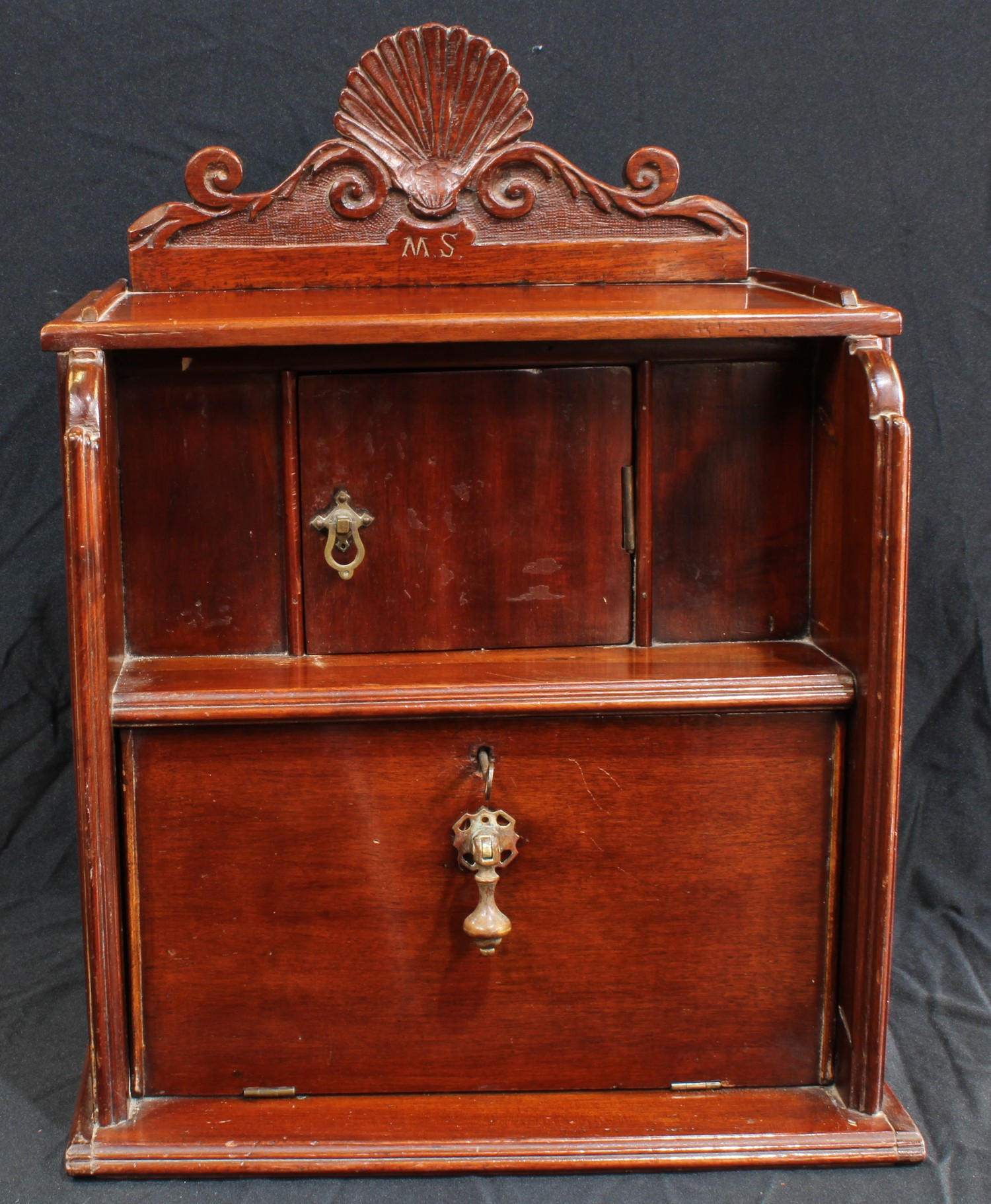 An early 20th century mahogany desk top cabinet, shaped cresting above an open niche and fall front, - Image 3 of 3