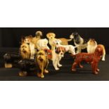A Coopercraft model of a Yorkshire terrier, 18cm high, others similar, Great Dane, Dalmation,