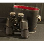 A pair of Super Zenith 10x50 binoculars, cased