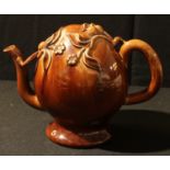 A 19th century Copeland & Garrett brown treacle glazed Cadogan ovoid teapot, impressed marks to