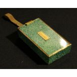 A faux shagreen compact and cigarette case