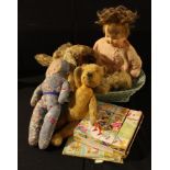 Toys - a mohair puppy pyjama case; a mohair Teddy bear; a doll; a cloth doll; a puzzle brick; a