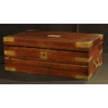 A George IV brass bound rosewood rectangular writing box, hinged cover enclosing a fold-out slope,