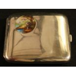 An early 20th century Continental silver and enamel rounded rectangular cigarette case, hinged cover