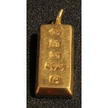 A 9ct gold ingot pendant, suspension loop, Sheffield 1977, 30.9g